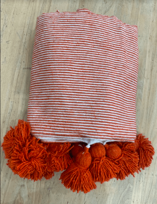 PLAID POMPONS RAYÉ TERRACOTTA & BLANC