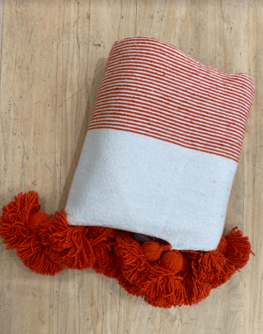 PLAID POMPONS TERRACOTTA RAYÉ & BLANC